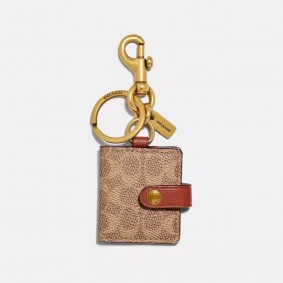 Coach Outlet Picture Frame Bag Charm In Signature Canvas Khaki 55785