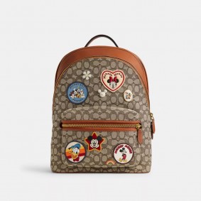Coach Outlet Disney X Coach Charter Backpack In Signature Textile Jacquard With Patches Cocoa Jacquard CG975